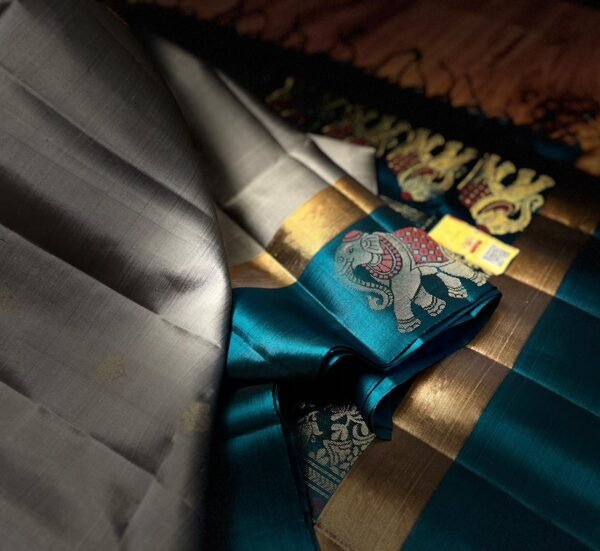 Elegant Grey Silk Saree with Gold Zari Buttas and Teal Contrast Border & Rich Elephant Pallu