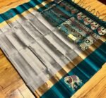 Elegant Grey Silk Saree with Gold Zari Buttas and Teal Contrast Border & Rich Elephant Pallu