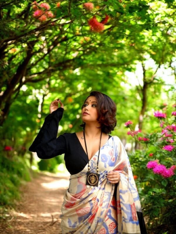 Elegant Ivory Pochampally Ikat Saree with Peacock & Deer Motifs and Rich Gold Zari Pallu