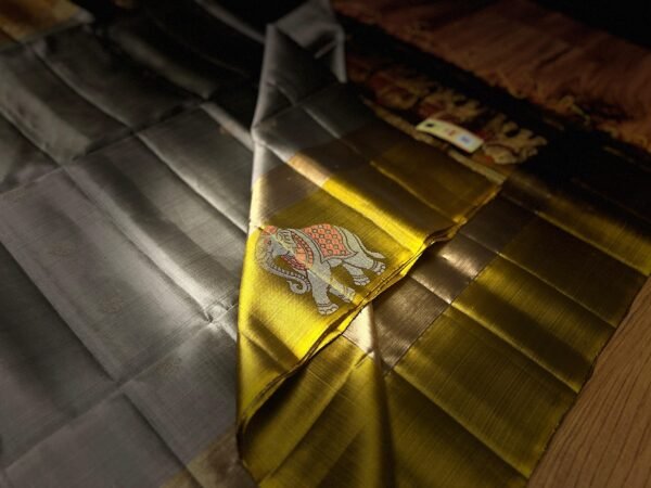 Elegant Grey Silk Saree with Rich Gold Zari Border & Traditional Elephant Motifs