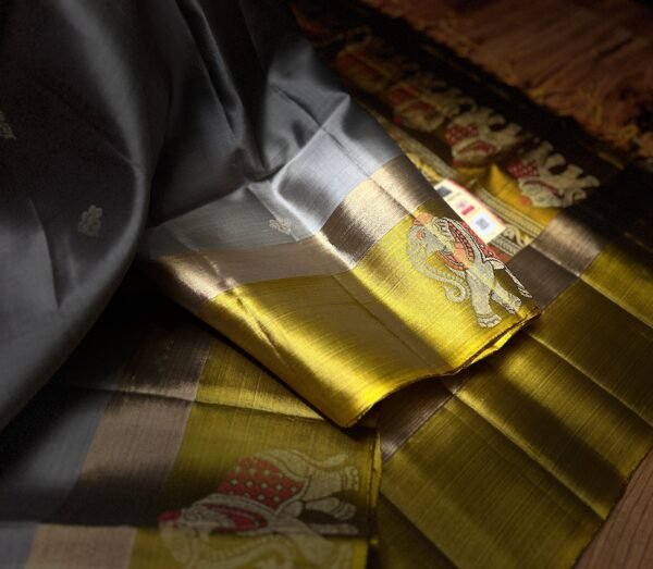 Elegant Grey Silk Saree with Rich Gold Zari Border & Traditional Elephant Motifs