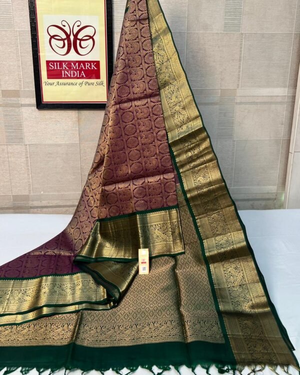 Elegant Wine Purple Silk Saree with Rich Gold Zari Weaving & Emerald Green Border