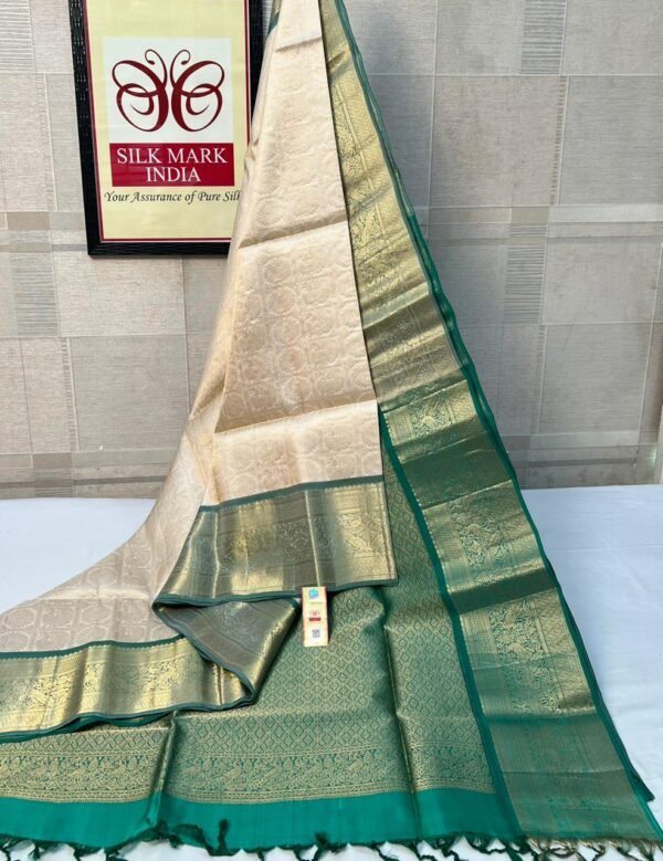 Classic Ivory Silk Saree with Rich Gold Zari Weaving & Emerald Green Border