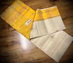 Elegant White Silk Saree with Gold Zari Buttas & Rich Yellow Pallu