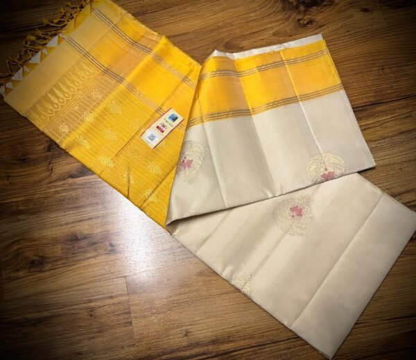 Elegant White Silk Saree with Gold Zari Buttas & Rich Yellow Pallu