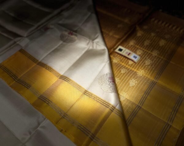 Elegant White Silk Saree with Gold Zari Buttas & Rich Yellow Pallu