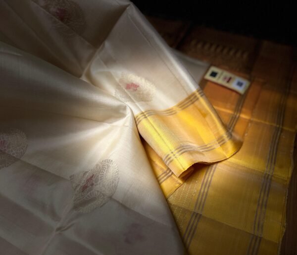 Elegant White Silk Saree with Gold Zari Buttas & Rich Yellow Pallu