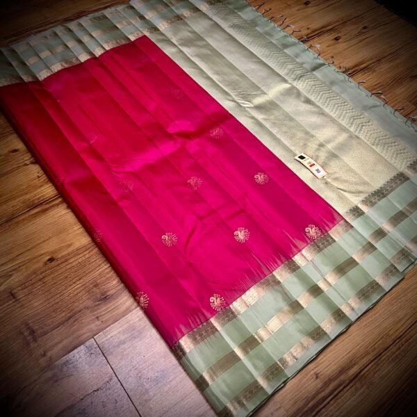 Elegant Mint Green & Rani Pink Kanchipuram Silk Saree with Rich Gold Zari Weaving