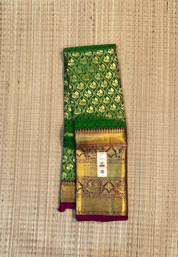 Emerald Green & Magenta Kanchipuram Silk Saree with Rich Gold Zari Border