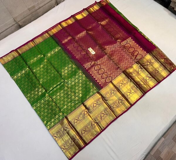 Emerald Green & Magenta Kanchipuram Silk Saree with Rich Gold Zari Border