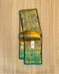 Luxurious Metallic Gold Soft Silk Saree with Rama Green Brocade Pallu and Peacock Motif Border