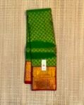 Traditional Parrot Green Soft Silk Saree with Elegant Gold Zari Diamond Grid and Contrast Red Pallu