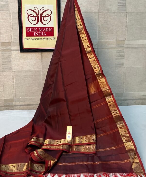 Deep Maroon Pure Silk Saree with Ornate Gold Zari Mayil (Peacock) Border