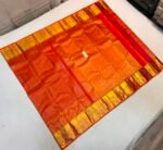 Radiant Tangerine Orange Soft Silk Saree with Ornate Gold Zari Grid and Festive Red Pallu