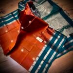 Rust Orange Kanchipuram Silk Saree with Peacock Gold Zari Motifs