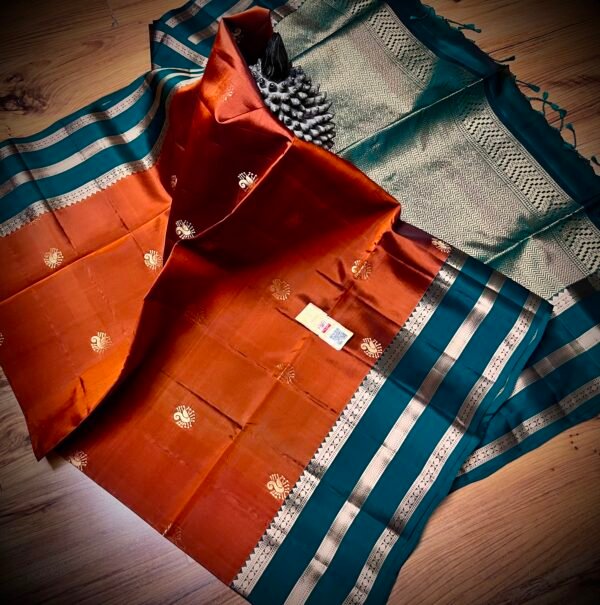 Rust Orange Kanchipuram Silk Saree with Peacock Gold Zari Motifs