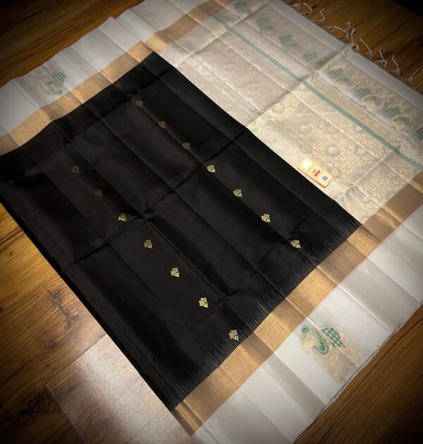 Elegant Black Kanchipuram Silk Saree with Gold Zari Buttas, Contrast White Border & Rich Gold Zari Pallu