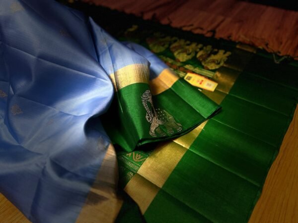 Elegant Sky Blue Kanchipuram Silk Saree with Gold Zari Buttas, Contrast Green Border & Rich Gold Zari Pallu