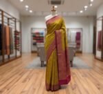 Elegant Olive Green Gold Zari Georgette Saree with Contrast Pink Rich Woven Border & Designer Pallu