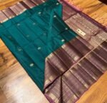 Luxurious Teal Green & Mauve Purple Soft Silk Saree with Heavy Gold Zari Weave